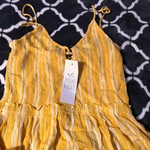 Yellow tank top peplum style